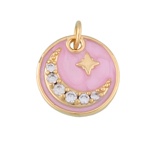 Pink enamel pendant with gold accents and a crescent moon on a white background