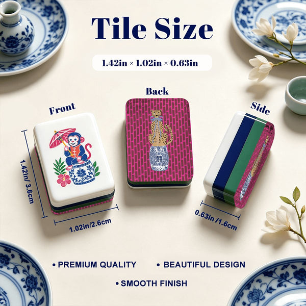 Tile size comparison graphic showing a small rectangular decorative tile from three angles: front, back, and side. The front view is white with blue floral detailing and a colorful monkey illustration; the back shows a pink patterned top with a gold vase motif; the side shows stacked blue, green, and white layers.