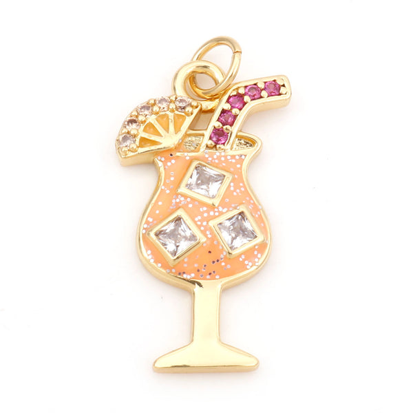 Gold charm shaped like a tropical cocktail glass with gemstones on a white background