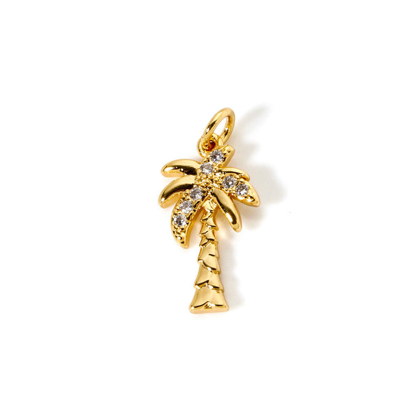 Gold palm tree pendant with embedded stones on a white background