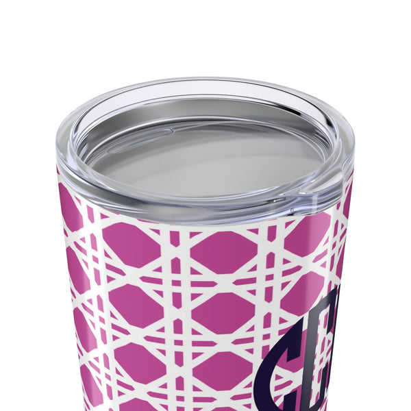 Tumbler with pink rattan caning pattern and navy monogram on a white background
