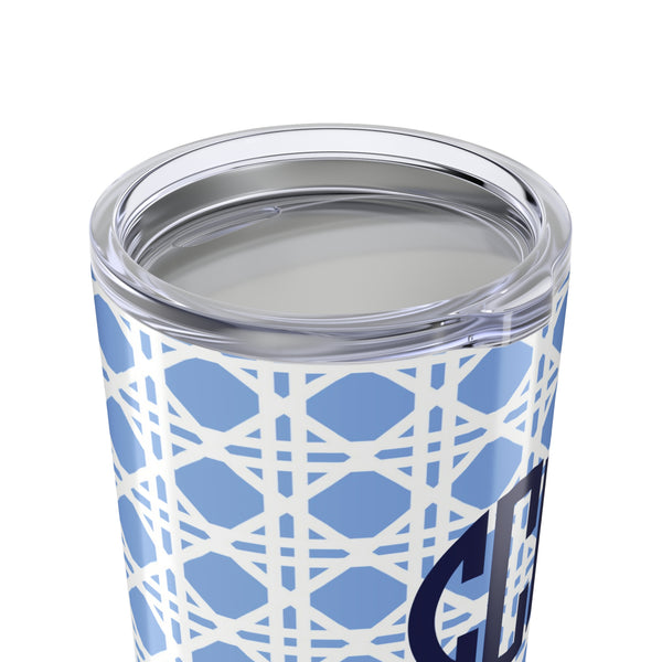 Tumbler with light blue rattan caning pattern and navy monogram on a white background
