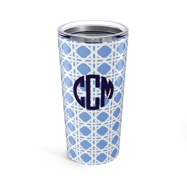 Tumbler with light blue rattan caning pattern and navy monogram on a white background