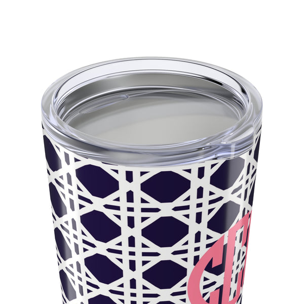Tumbler with navy rattan caning pattern and pink monogram on a white background