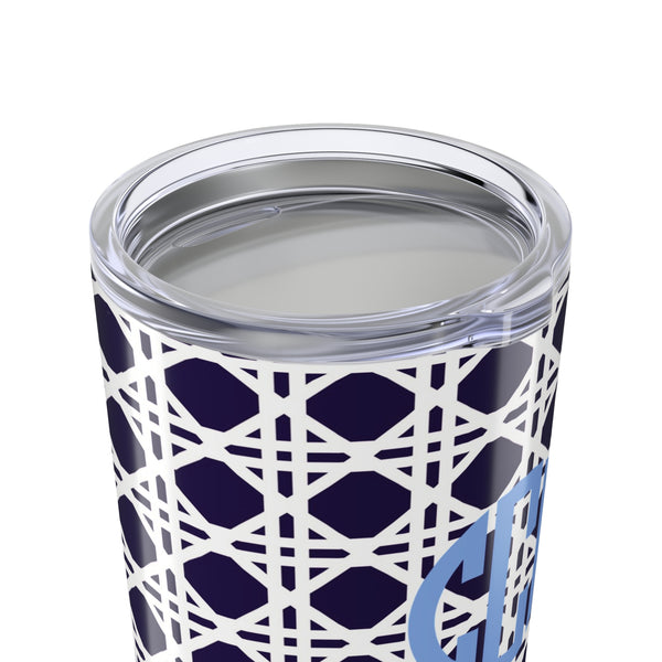 Tumbler with navy rattan caning pattern and light blue monogram on a white background