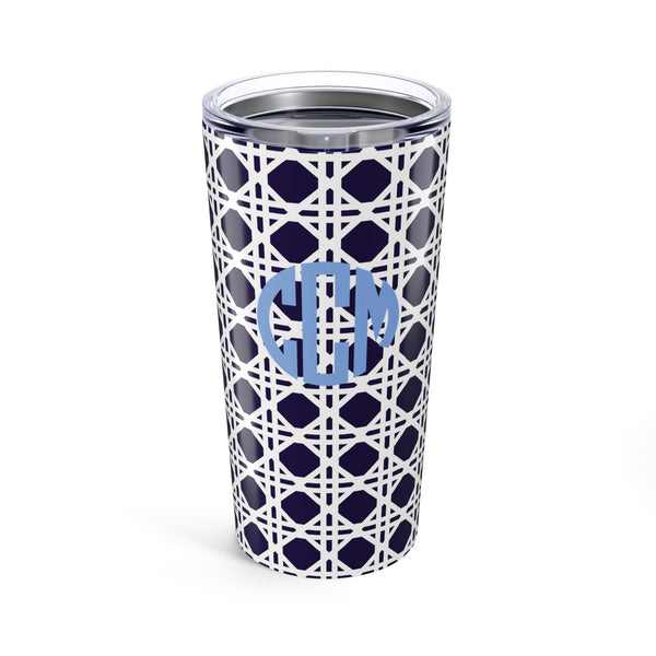 Tumbler with navy rattan caning pattern and light blue monogram on a white background