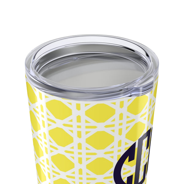 Tumbler with yellow rattan caning pattern and navy monogram on a white background