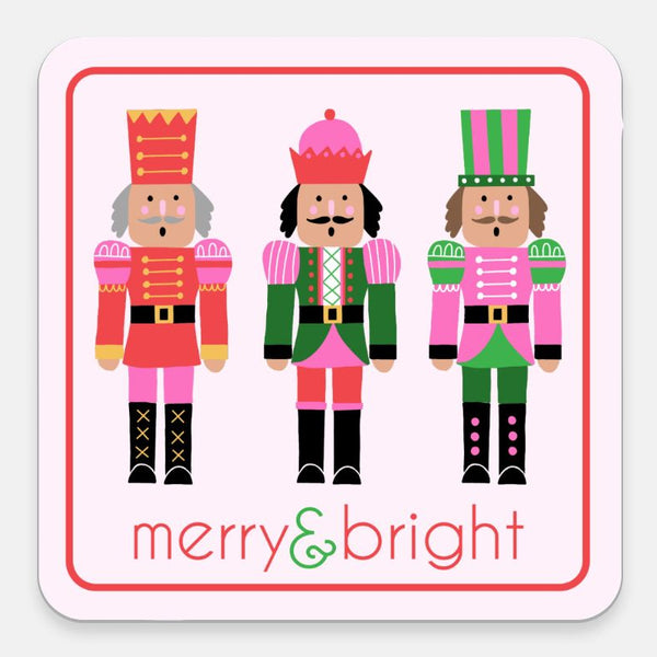 Three colorful nutcrackers with 'merry & bright' text on a white background