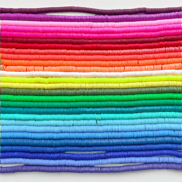 Stack of colorful heishi bead options in a rainbow pattern on a white background