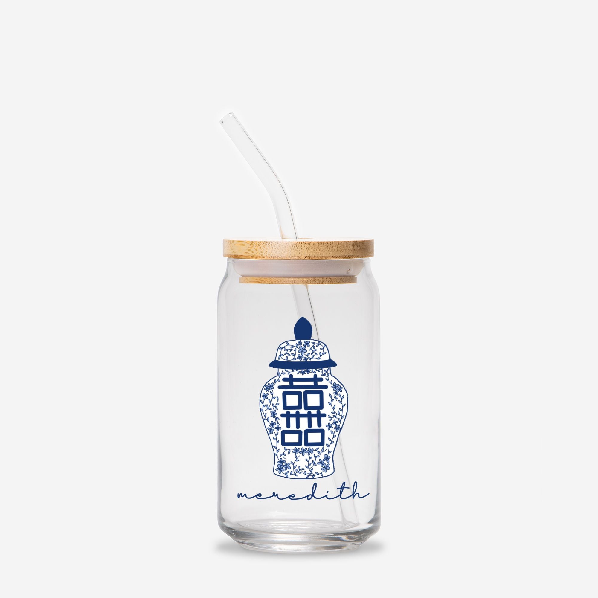 Clear glass tumbler with bamboo lid and straw featuring a blue ginger jar design and the name 'meredith'.