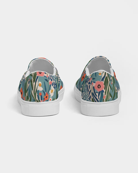 Floral-patterned slip-on shoes on a white background