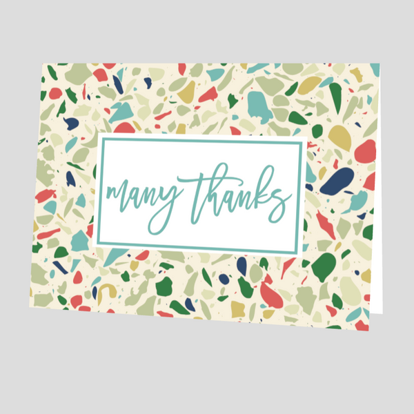 Colorful patterned card with 'many thanks' text on a gray background