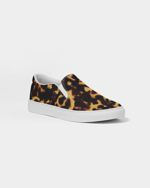 Tortoiseshell print slip-on sneaker with white sole on a light gray background