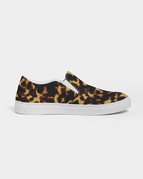 Tortoiseshell print slip-on sneaker with a white sole on a light gray background