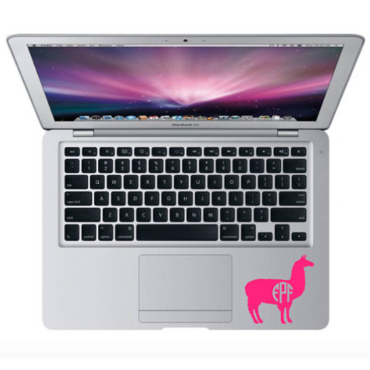 Monogrammed llama decal on macbook by track pad