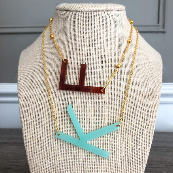 belle and ten colorful acrylic necklaces