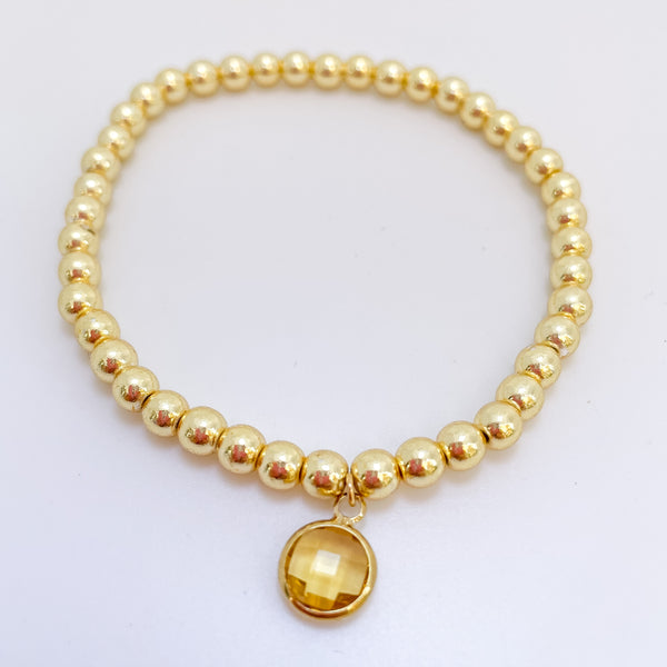 Georgie Gold Bead Bracelet with Charm